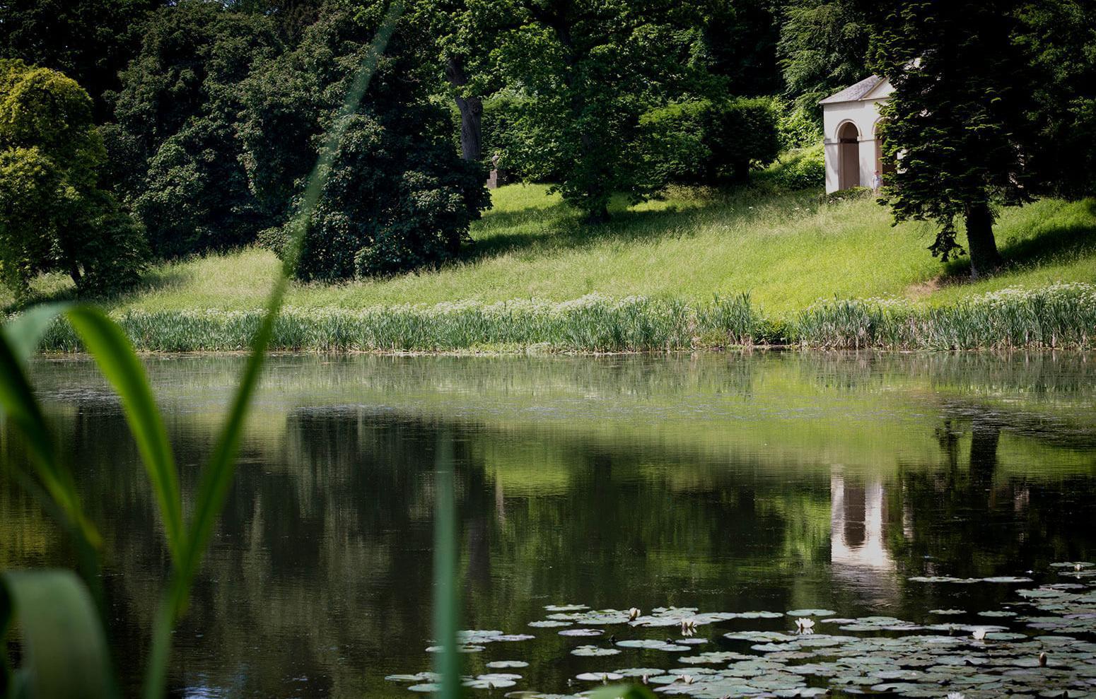 The temple building reflected in lake waters