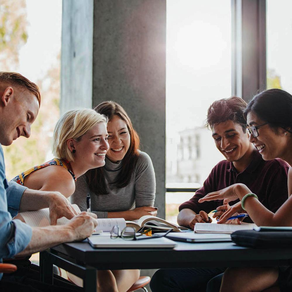A group of students studying at a table