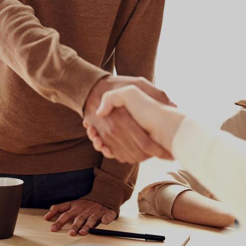 Two people shaking hands