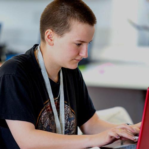Student working on a laptop