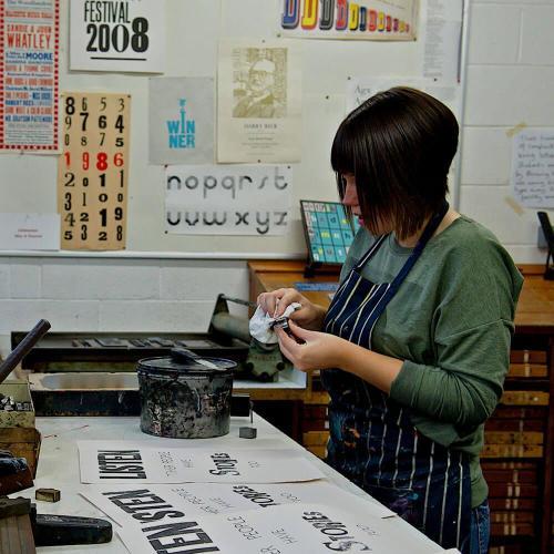 Student with letterpress