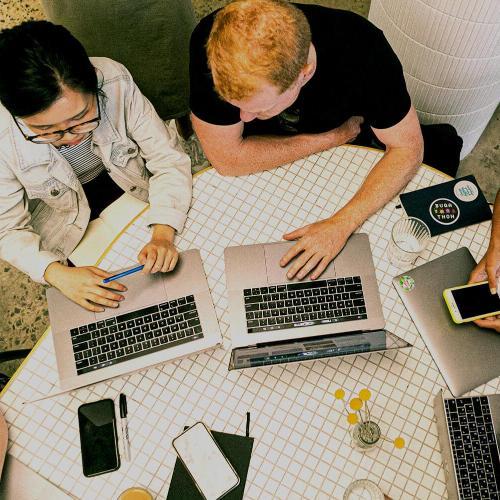 Students sat around a table working