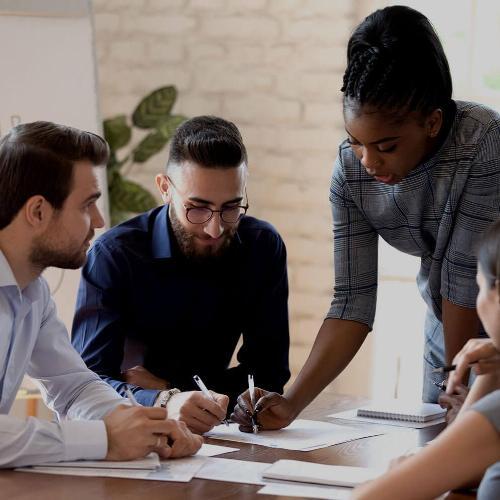 Diverse group of people working together at a table
