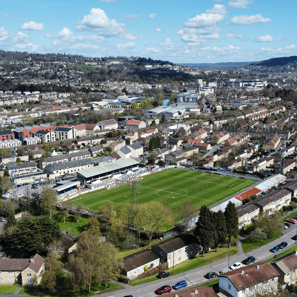 An aerial shot of Twerton Park's football pitch, surrounded by residential housing