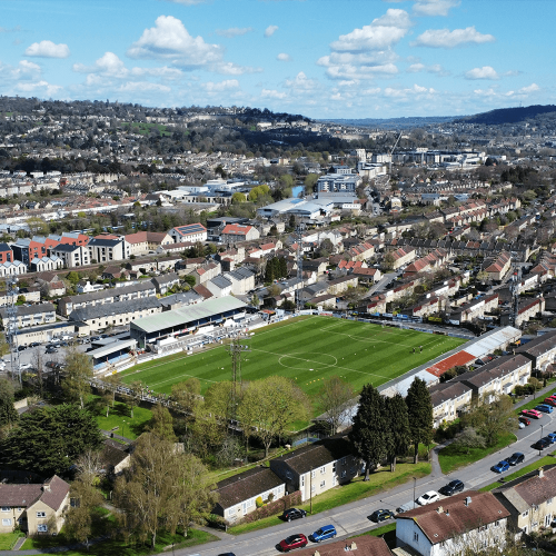 An aerial shot of Twerton Park's football pitch, surrounded by residential housing