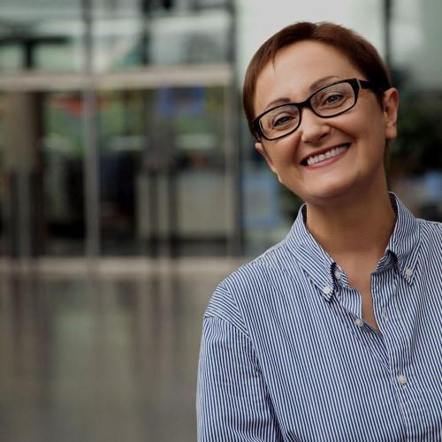 Woman smiling and looking at camera