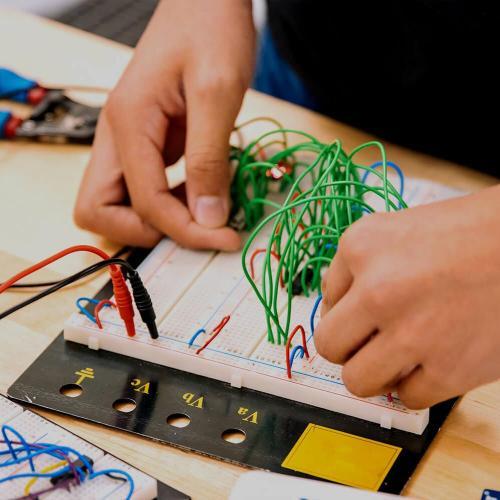 Student building a circuit.