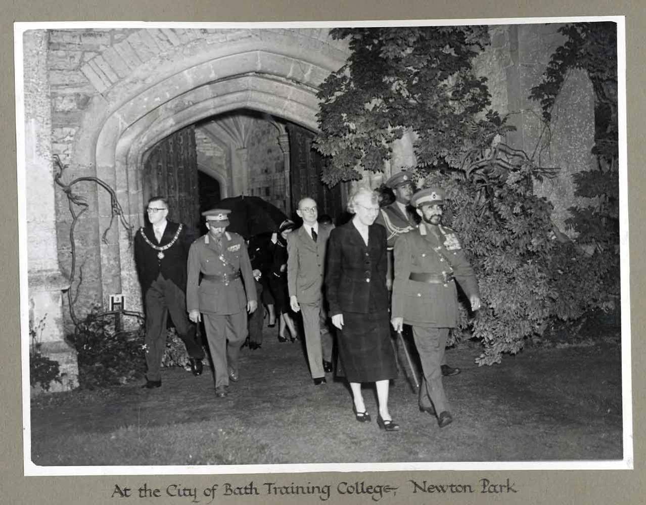Old photograph of people in coats at Newton Park, including Emperor Haile Selassie