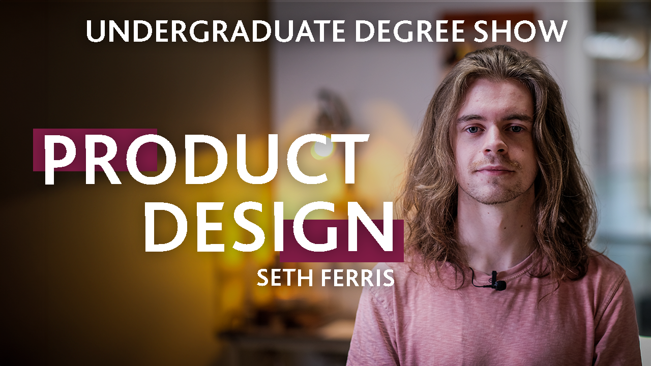 A person wearing a pink t-shirt with text that reads: Seth Ferris, Product Design, Undergraduate Degree Show
