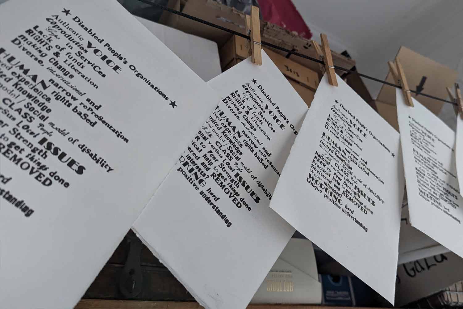 Flyers for DPO hanging on a line