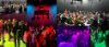 A collage of images of people in a dimly lit audiovisual studio