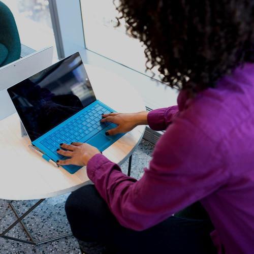 A woman working on a laptop